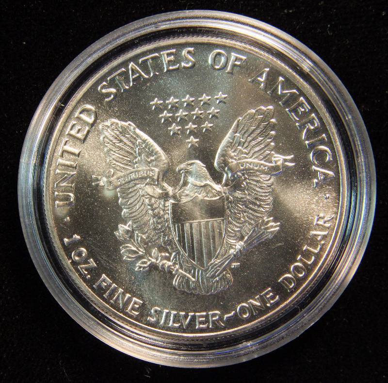 1988 AMERICAN SILVER EAGLE 1 TROY OZ. .999 FINE SILVER DOLLAR IN AIRTITE CAPSULE