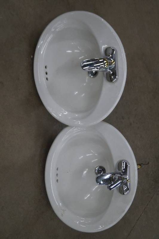 lot 28 image: Sinks with faucets