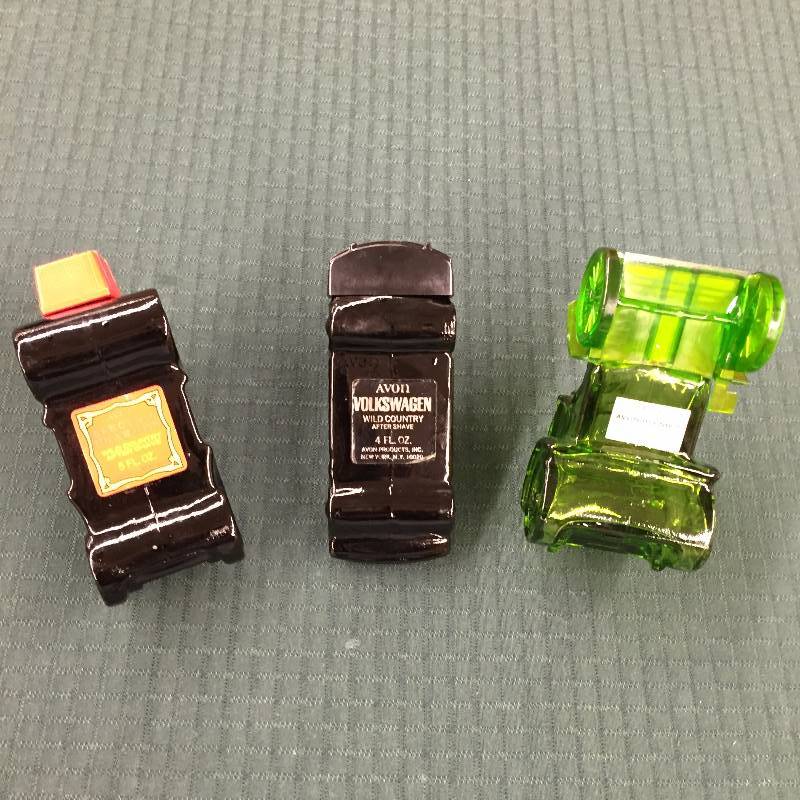 lot 76 image: 3 Vintage Avon Cologne Cars VW Model T etc