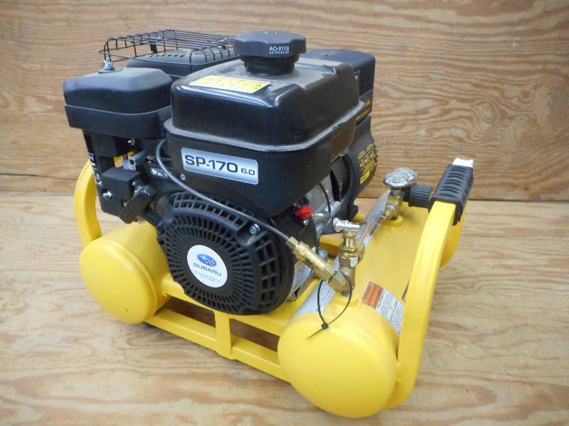 lot 1 image: Like New DeWalt Gas-Powered Air Compressor