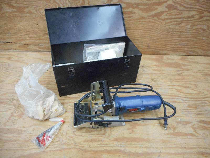 lot 14 image: Ryobi 120Volt Metal Saw With Bag ...