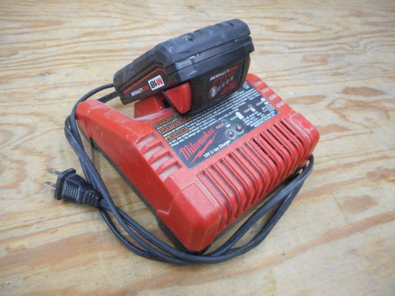 lot 31 image: Milwaukee 18Volt Charger With M18 B...