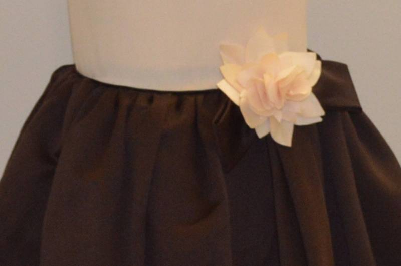 lot 102 image: Peachy Cream and Chocolate Brown Flower Girl Dress