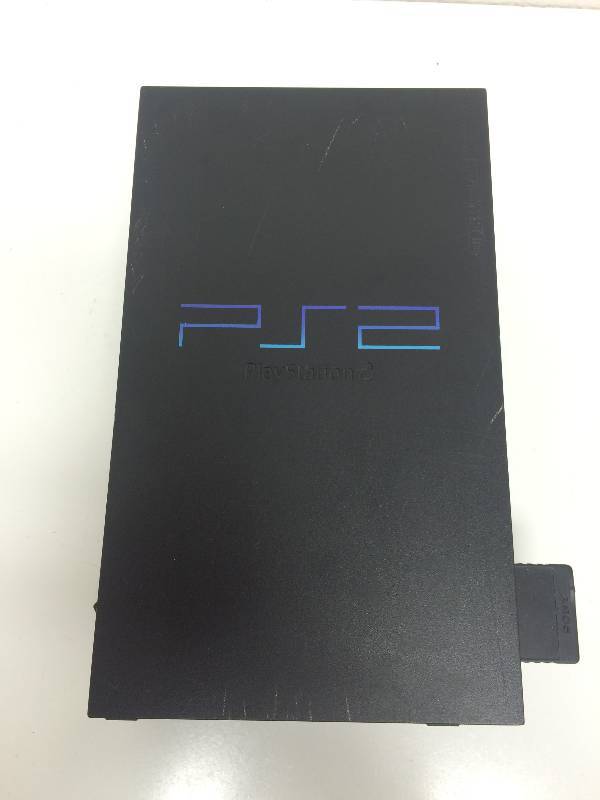 lot 6 image: Sony Playstation 2 and Games