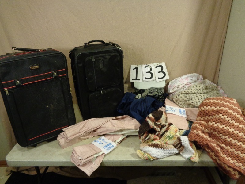 Suitcases and Afghan Blankets