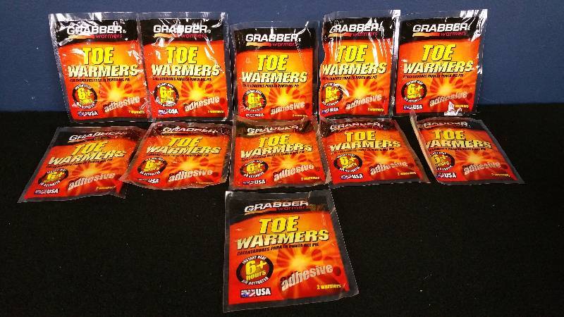 lot 62 image: Group  of (11) Grabber Toe Warmers