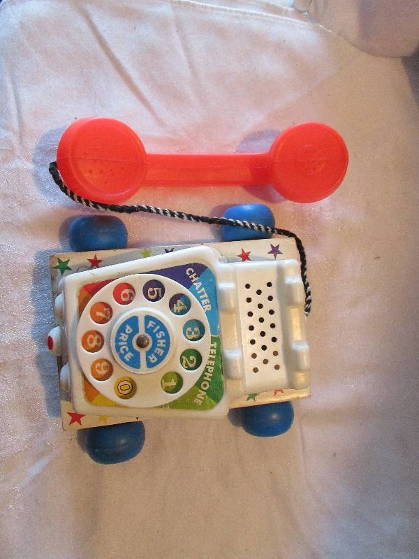 lot 77 image: fisherprice chatter telephone