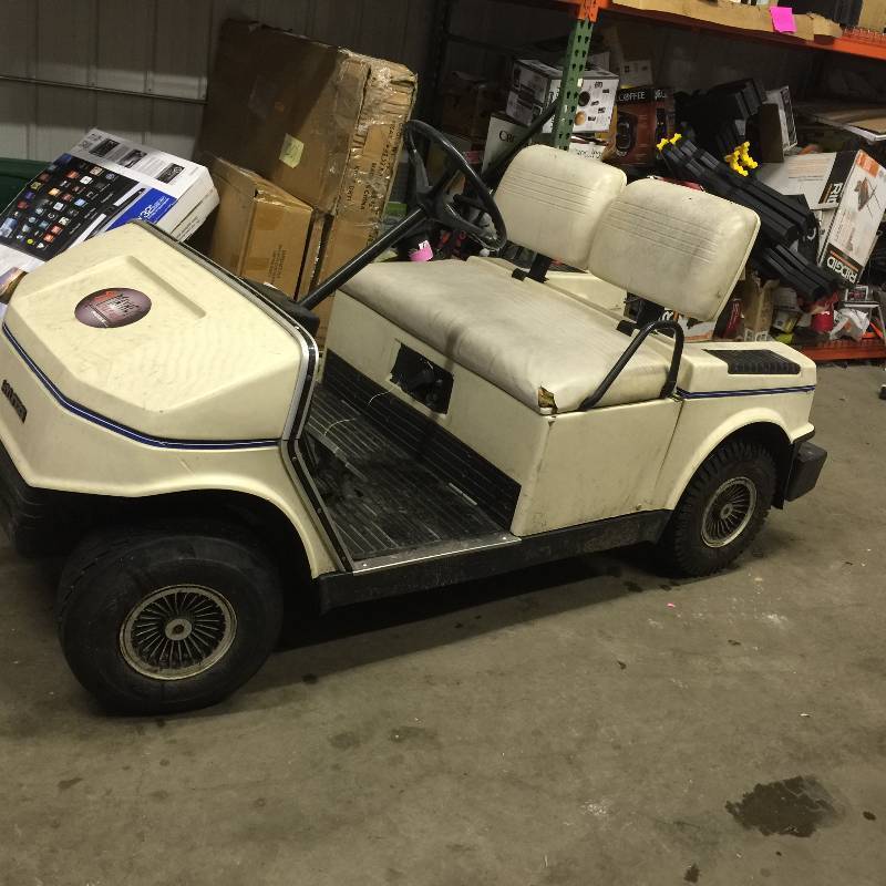 Hyundai Golf Cart Used runs and drives has minor upholstery damage , choke is missing but it has been adapted with a wire.