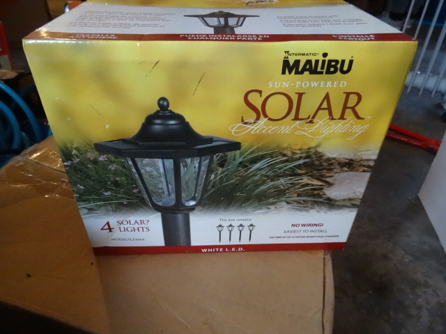 Malibu solar light. Has four total lights new in box