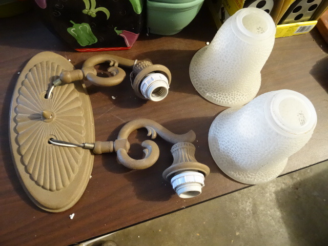 Wall mount light fixture with two globes