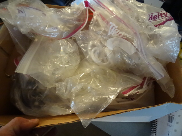 Box full of shower curtain rings - Plastic and stainless steel rings