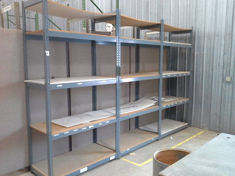 3 Gray shelving units