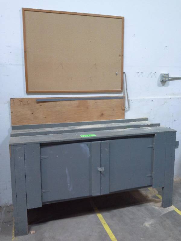 Workbench with underneath storage and bulletin board