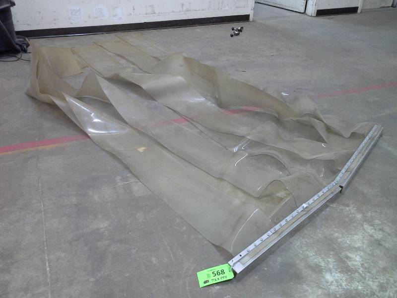 Plastic climate barrier for doorways