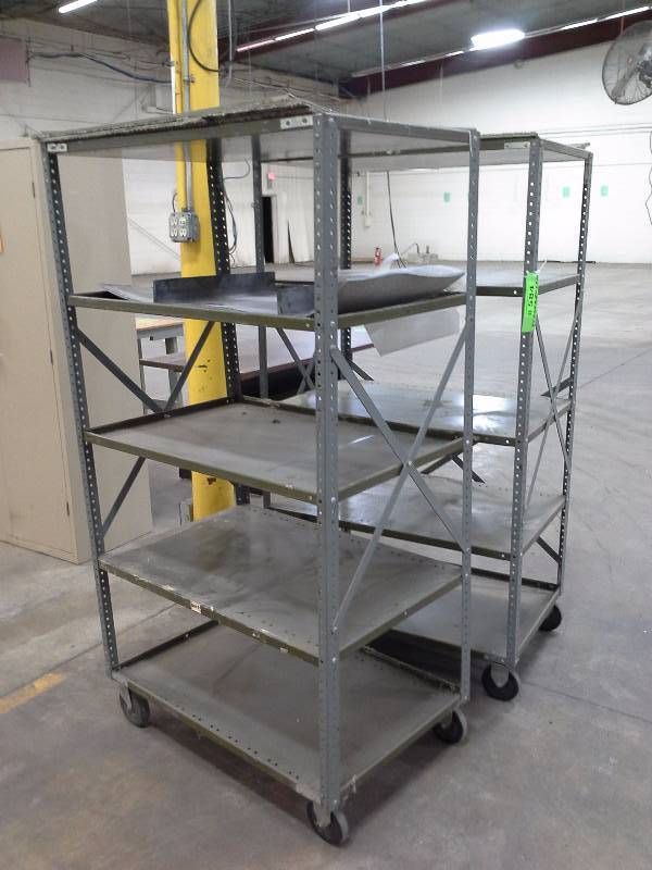 A pair of rolling cartsshelving