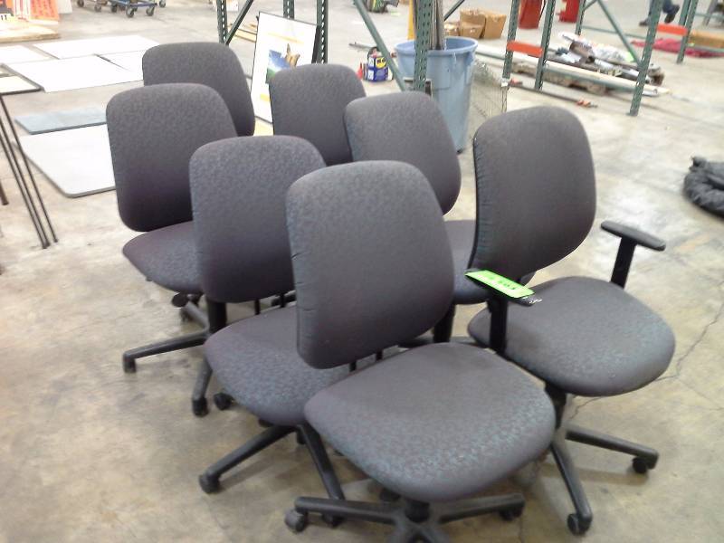 Lot of seven matching office chairs