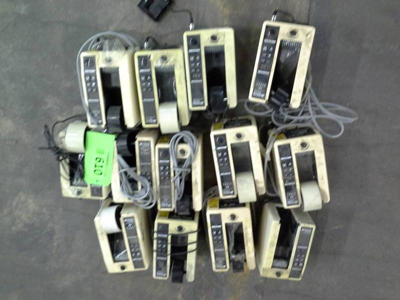 Approximately 13 industrial tape dispensers