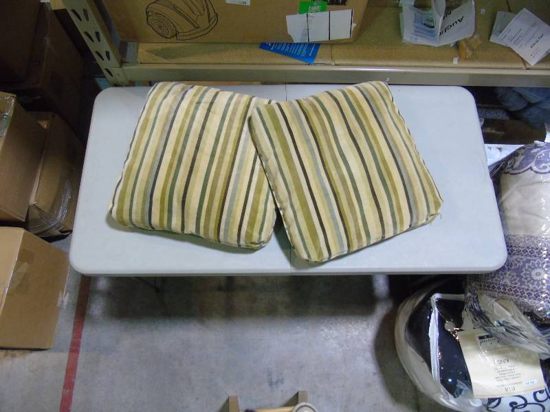 Two striped square pillows