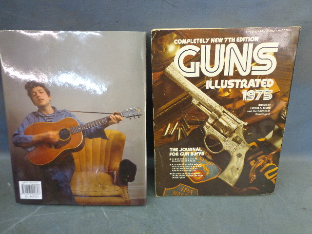 lot 54 image: Bob Dylan & Guns Illustrated Books