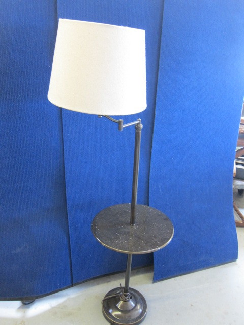 Lamp with built in table
