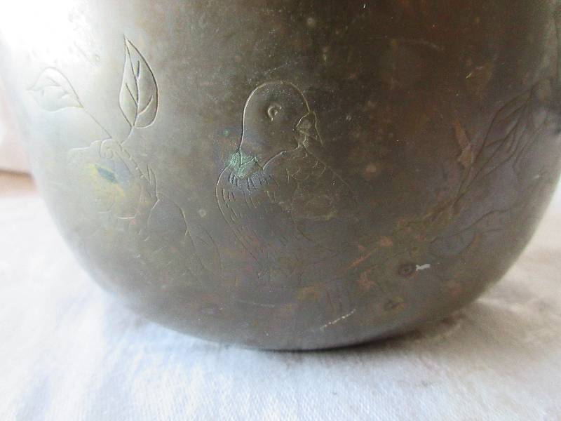 copper bowl over brass