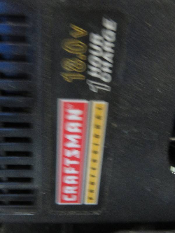 lot 92 image: Craftsman Pro Series 5 12 Saw, Flashlight, and battery and charger in case