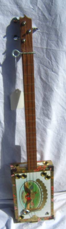lot 644-COPY image: Cigar box Electric Guitar