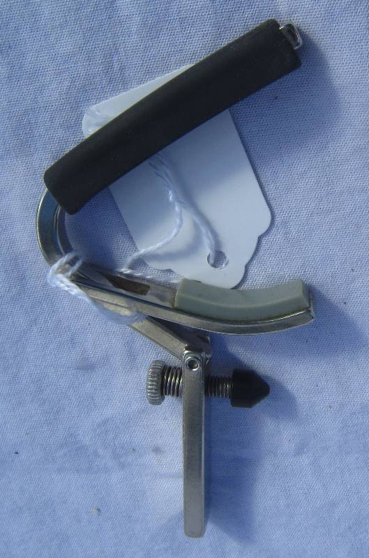 lot 690-COPY image: Silver Shubb Guitar Capo