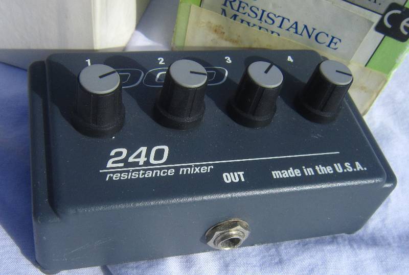 lot 679-COPY image: DOD 4 to 1 14 guitar pedal with volume control.