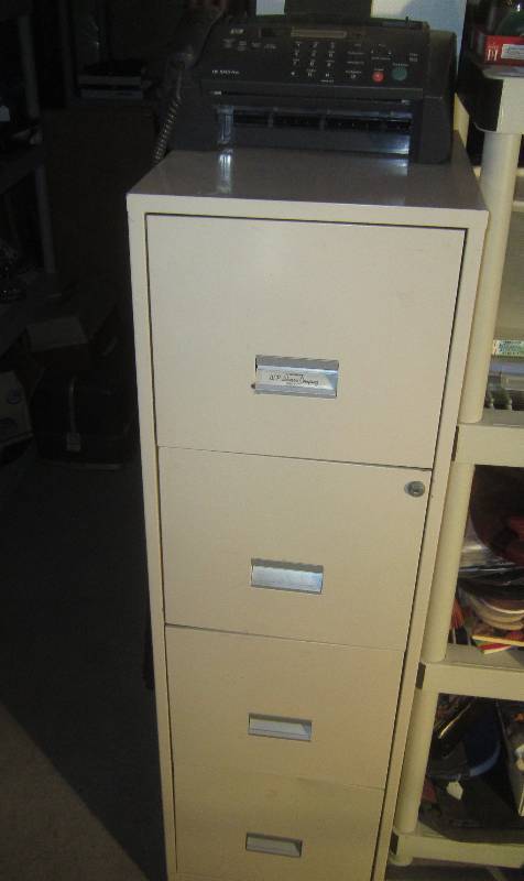 lot 835 image: File Cabinet and Fax Machine