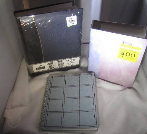 lot 857 image: 2 New Photo Books and Suede Lined Notebook