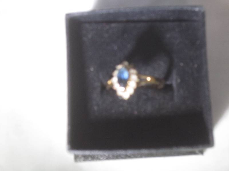 lot 894 image: Gold Ring with Dark Stone