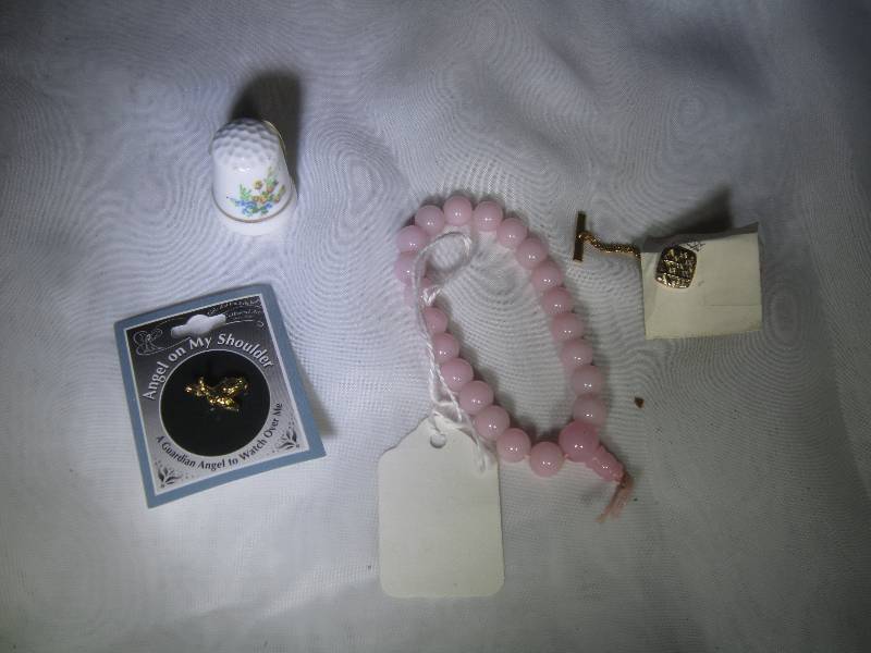 lot 903 image: Beaded Pink Bracelet, Angel Pin, Thimble, Tie Clip
