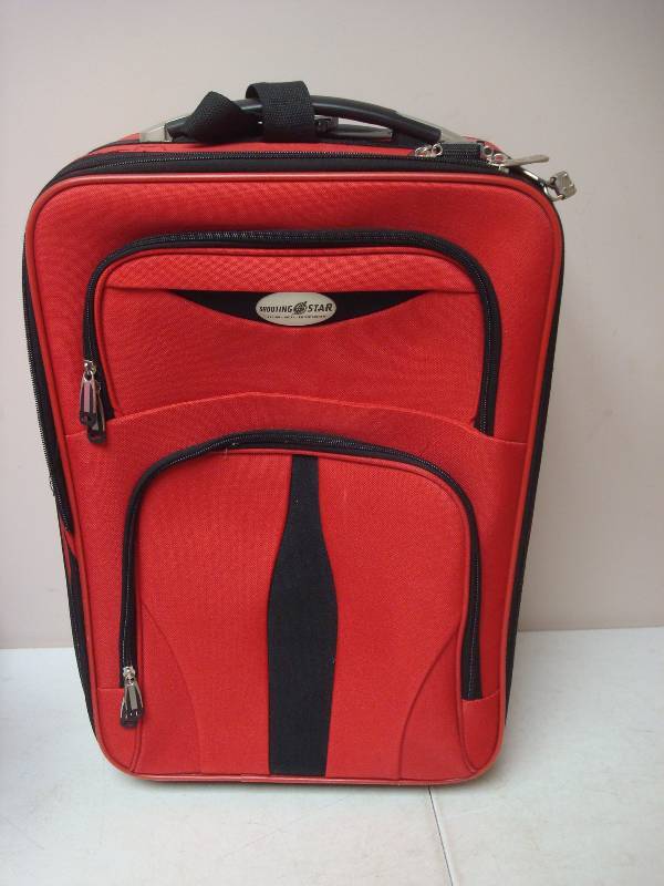 lot 45 image: Red Roller Suit Case Bag, Shooting Star Give Away, Used, Good Condition