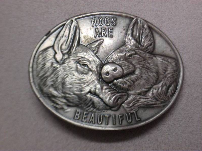 lot 101 image: Hogs Are Beautiful Metal Belt Buckle