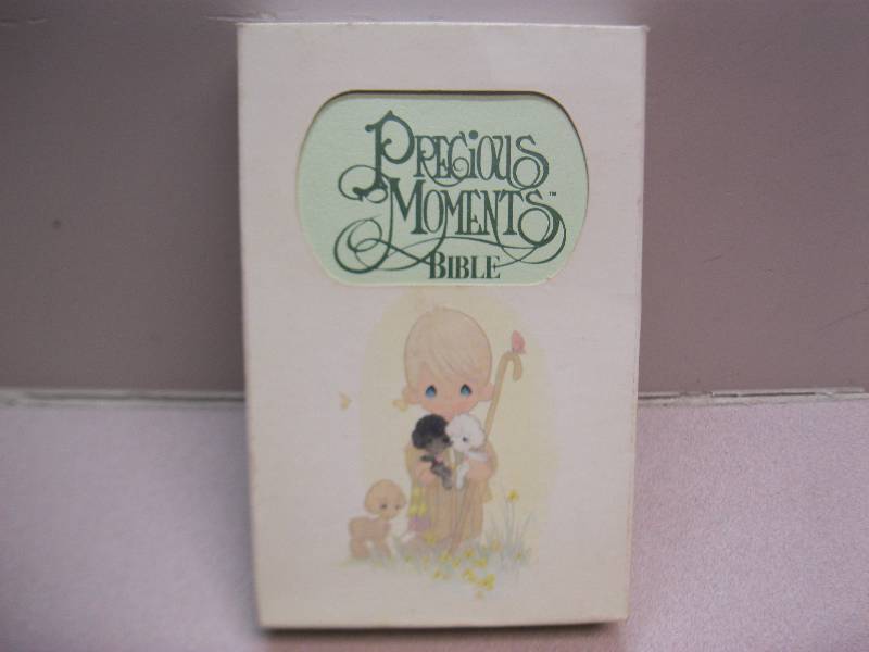 lot 104 image: Precious Moments Bibles, Personalized To Someone