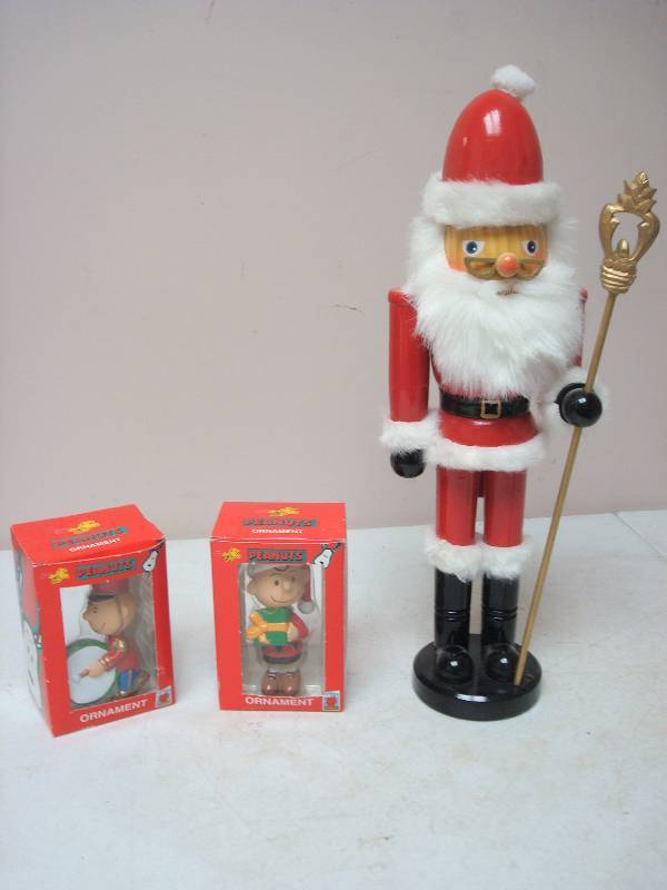 lot 140 image: Two Peanuts Ornaments And Nutcracker