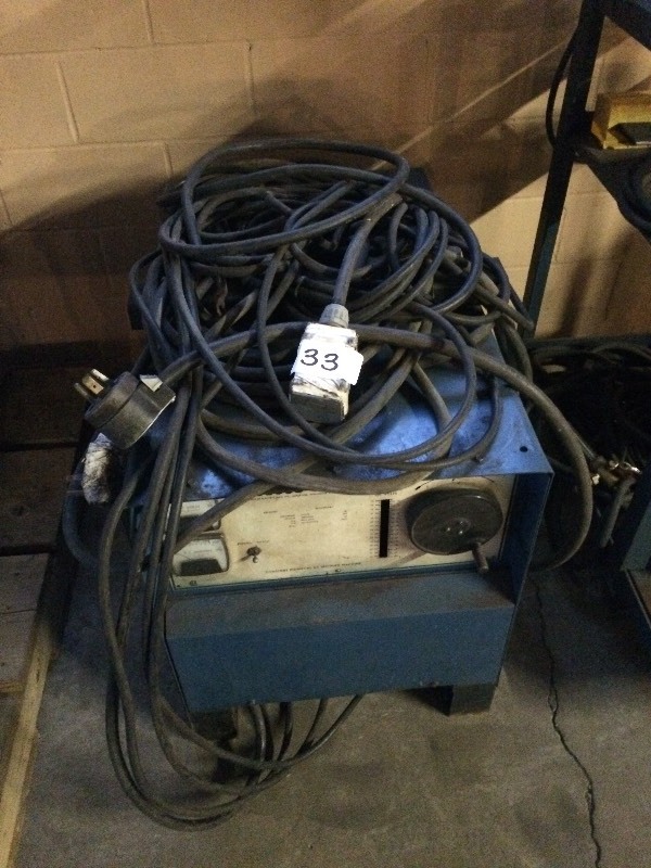 lot 33 image: Miller welder and cart