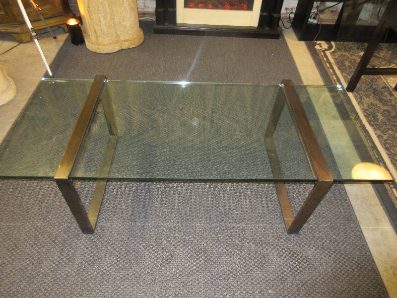 lot 11 image: Glass Coffee Table and Lion and Zebra Prints