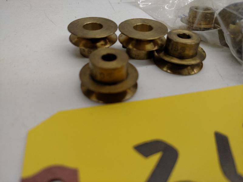 lot 217 image: (8) 23-36-119 (G1216) Brass Pulleys...
