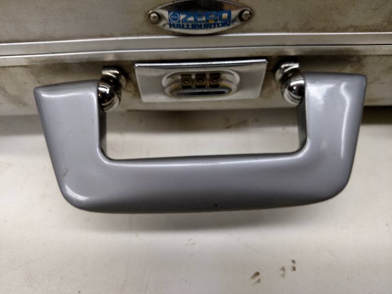 lot 305 image: Aluminum Briefcase...