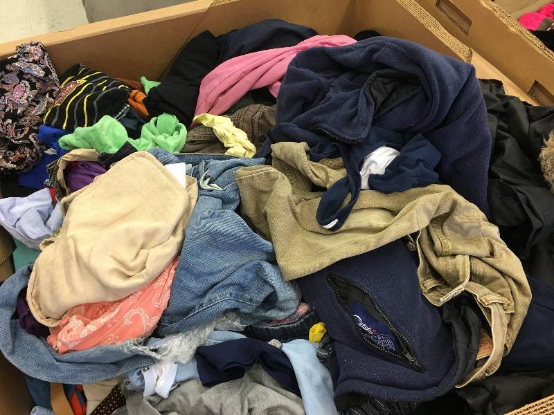 Large gaylord of clothing random sizes and colors