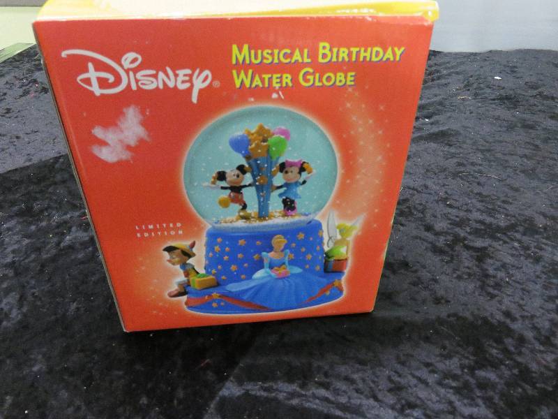 Disney Snow Globe plays music