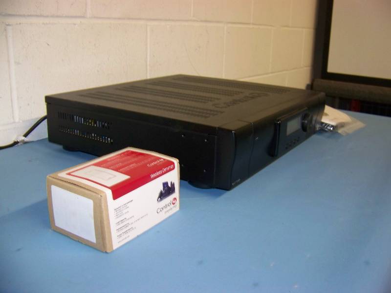 lot 40 image: Control 4, MultiTuner  Multi Tuner and Wireless Dimmer Control