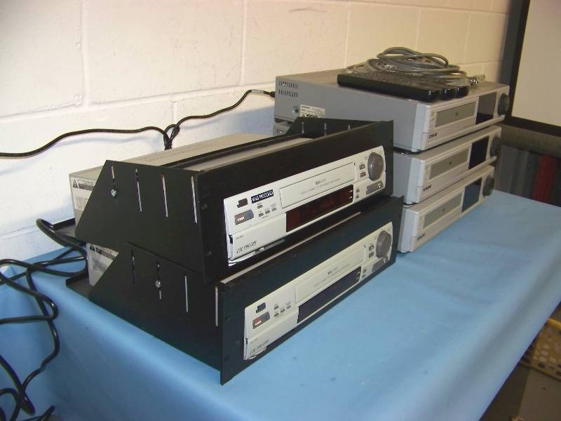 lot 111 image: (2) JVC VCRs in Rack Shelves and (3) Sony VCRs with Remote Controls