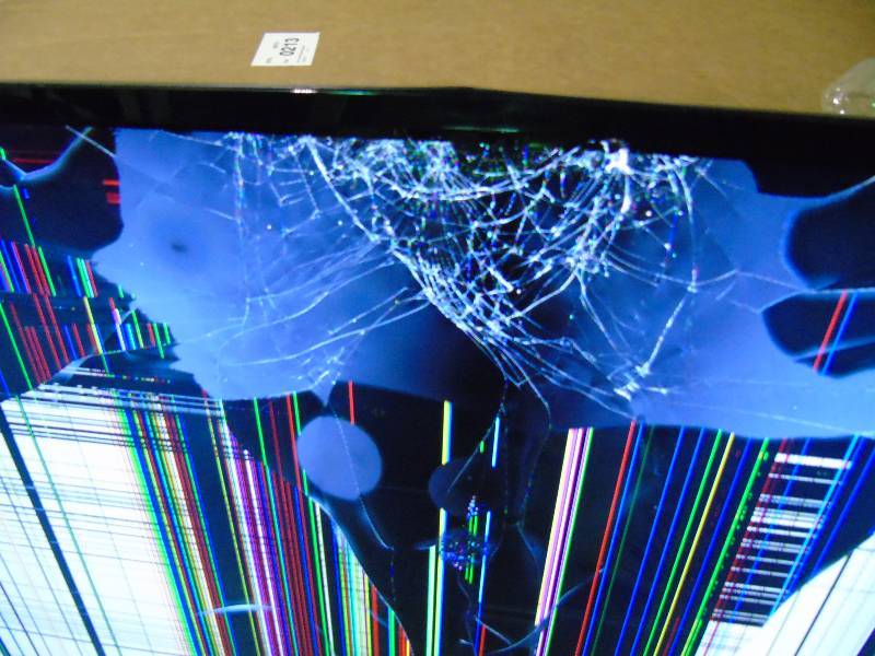 lot 14 image: Sharp AQUOS 55 1080p LED Smart TV (cracked)