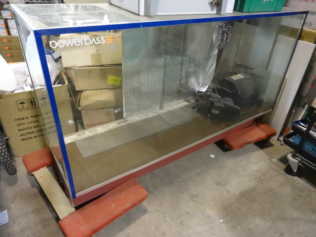 USED Glass Display Case. Approx 70x48x20 in. Adjustable Glass Shelves included. Display Case ONLY. NO CONTENTS NOR ROLLING CART INCLUDED