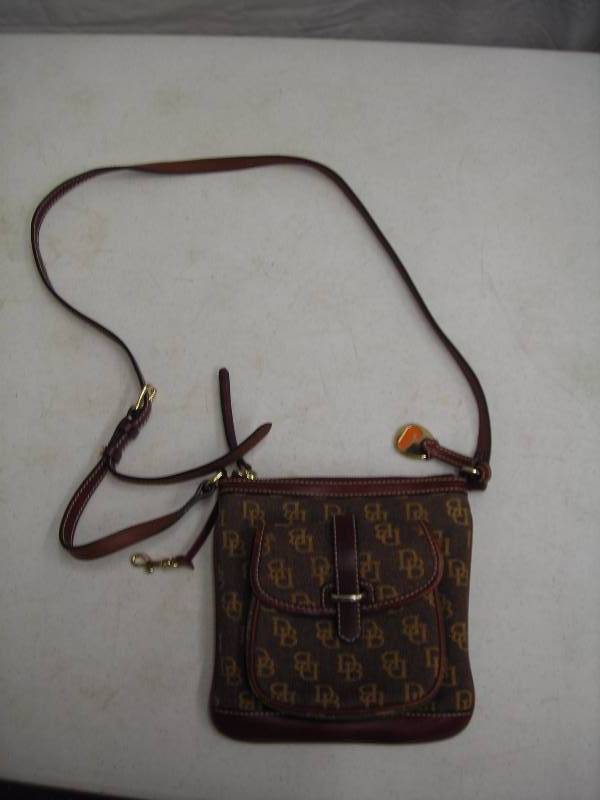 lot 38 image: Dooney & Burke Leather Trimmed Signature Like New