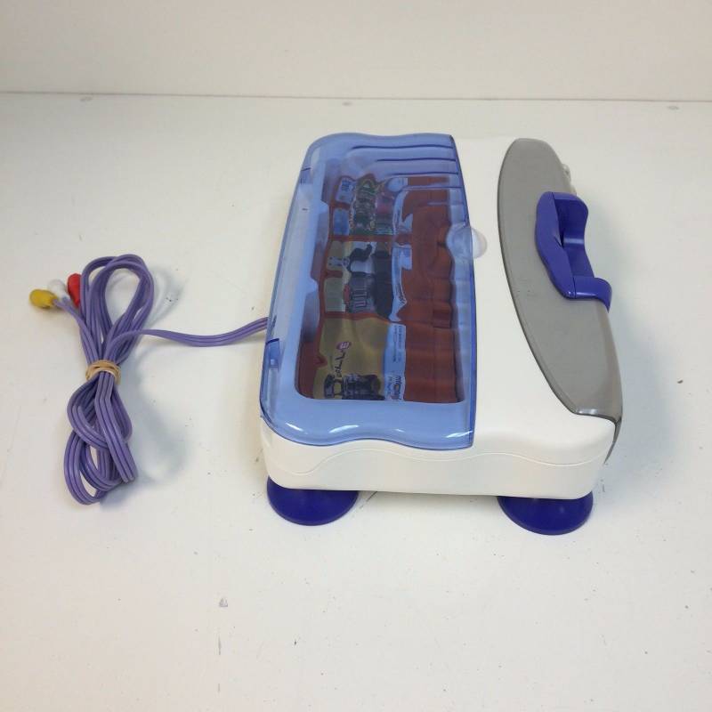 lot 22 image: VTech V.Smile V-Motion Learning System Bundle
