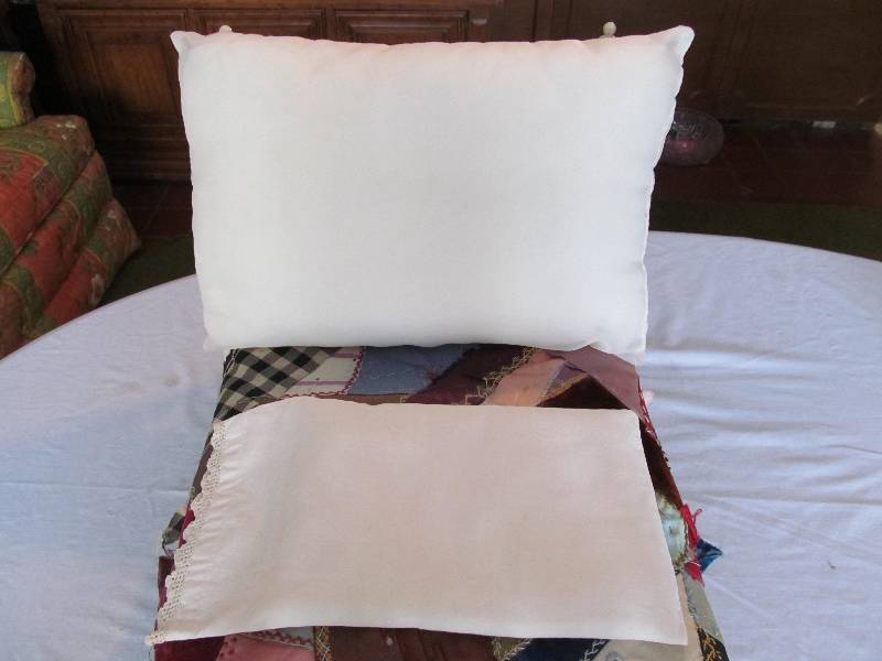 Vintage Bed With Homemade Quilt